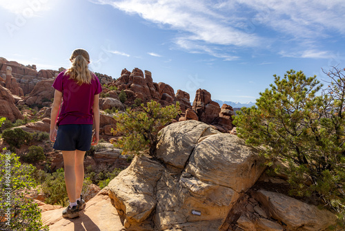 Young girl getting ready to hike the Fiery Furnace at Arches National Park photo