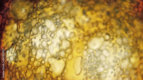 Bubbling melting plastic film of old close-up
