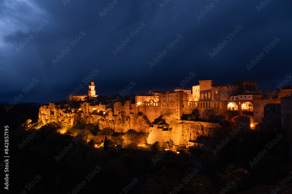 Pitigliano view of the old city at night Pitigliano view of the old city at night