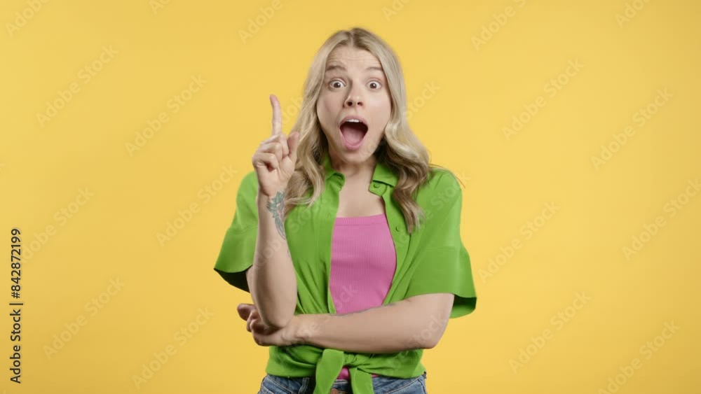 Breakthrough creative idea, 30s aged woman have eureka moment,pointing finger up Breakthrough creative idea, 30s aged woman have eureka moment,pointing finger up