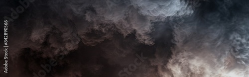 Dark and thick clouds of smoke after the explosion. Natural disaster, explosion, fire, earthquake. Natural disaster concept. Mist wallpaper.  © Olga