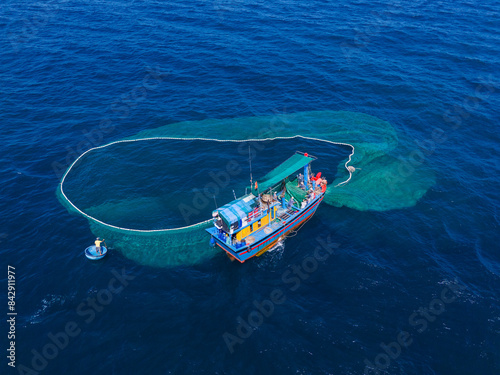 Aerial view of traditional wooden boat and fishermen are fishing anchovies in Yen Island, Phu Yen province, Vietnam