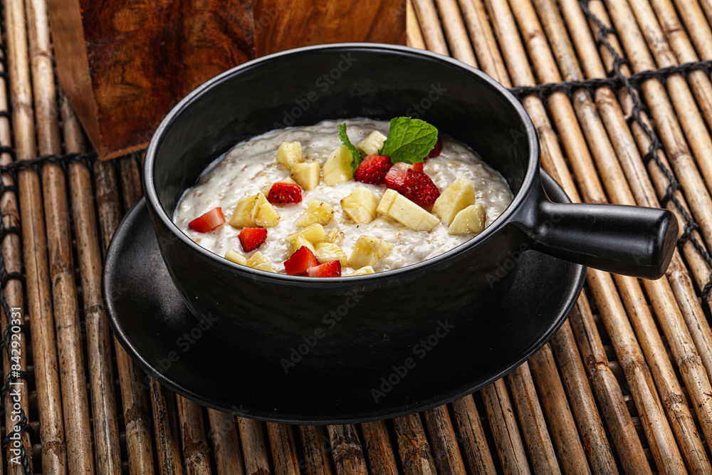 Breakfast sweet porrige with banana Breakfast sweet porrige with banana