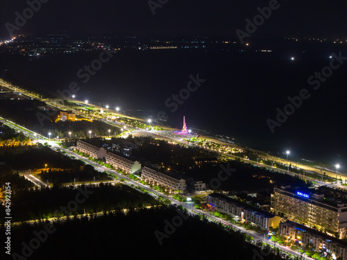 Night at Nghinh Phong tower square in Tuy Hoa coastal city, Phu Yen province, Vietnam. This is a new place that attracts tourists and locals. Travel and landscape concept photo