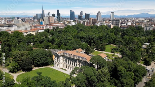 Obraz na płótnie Italy, Milan , drone aerial view of Villa Reale and the new skyline with modern skyscrapers in downtown of the fashion city in Giardini di Porta Venezia Montanelli park . Milan Green city w salonie
