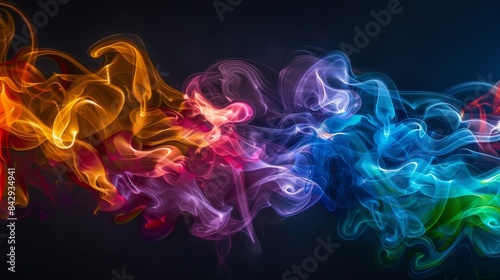 Abstract pattern of colorful cigarette smoke captured against a black background, resembling art in motion © Plaifah