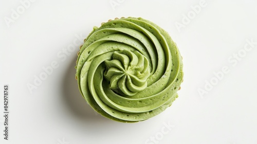 Green vanilla cookie with cream seen from above on a white background