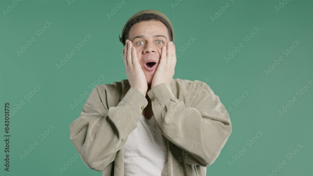 Shocked african american man glad, screaming OMG. Impressed guy, unbelievable
