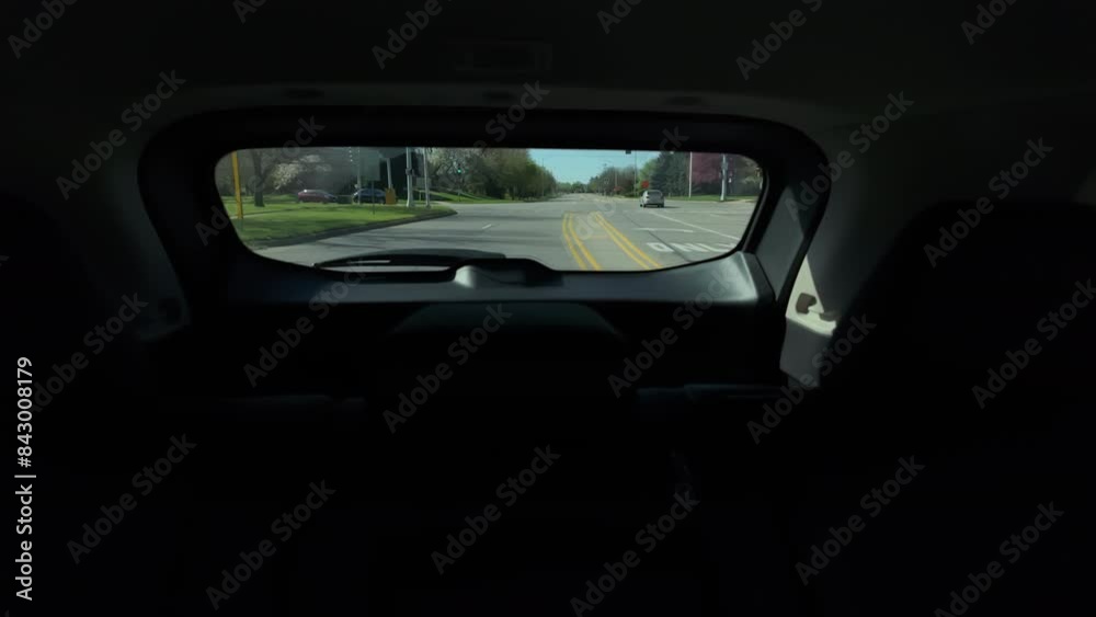 Highway driving, camera inside of car, wide POV view on the back window