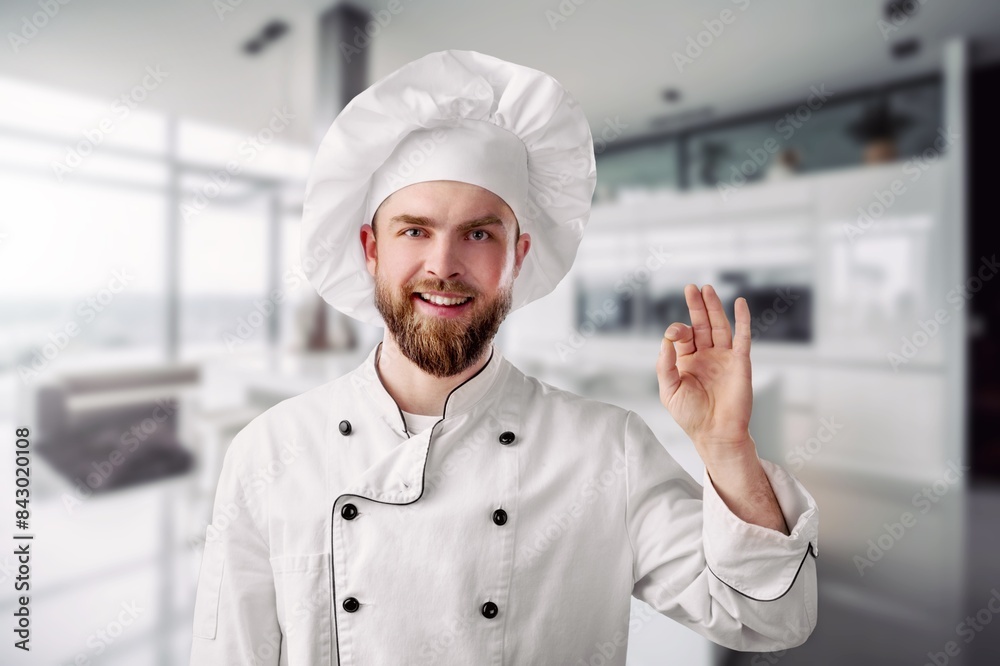 Young beautiful man chef cooking Young beautiful man chef cooking