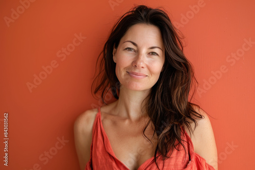 A close up portrait of a young woman with a subtle smile © MagnusCort