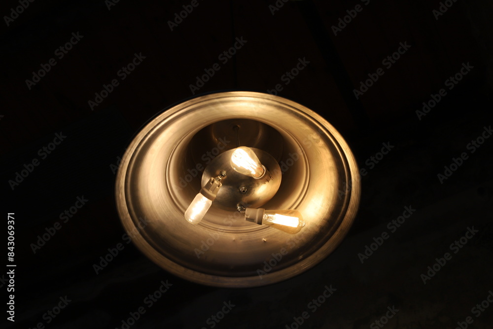 A lamp for illuminating the interior of the room hangs on the ceiling. A lamp for illuminating the interior of the room hangs on the ceiling.