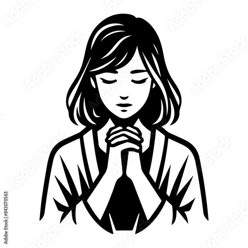 Silhouette of woman praying