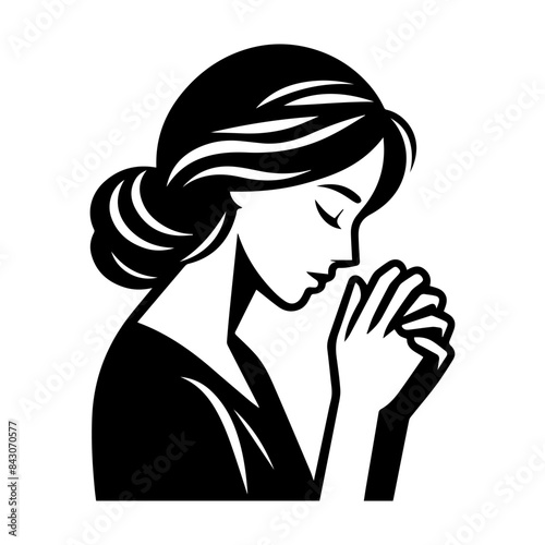 Silhouette of woman praying