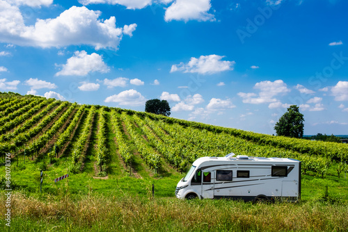 Konstfotografi Modern camper van motorhome parking in a vineyard in freedom vanlife lifestyle and travel journey adventure alternative holiday vacation with recreational vehicle