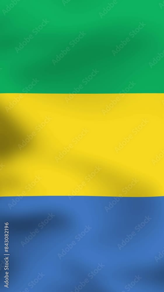 Vertical, portrait, waving national flag of Gabon. Smooth animation with highly detailed, realistic animated background for social media, screens smartphone. Official colors, cloth motion Vertical, portrait, waving national flag of Gabon. Smooth animation with highly detailed, realistic animated background for social media, screens smartphone. Official colors, cloth motion