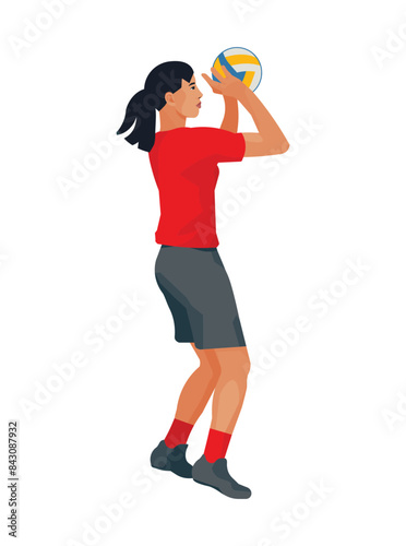 Thai women's volleyball girl player in a red T-shirt in profile jumps up to push the ball with two hands