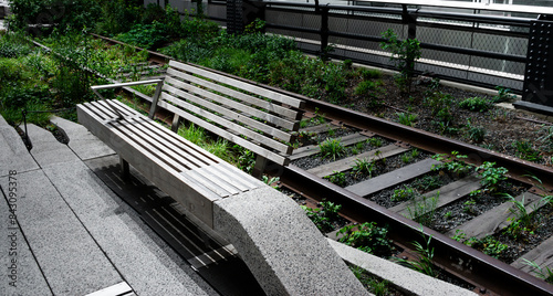 Bench on the high line park in Manhatten New York. A repurposed railway line is now visited by tourists and locals every day.