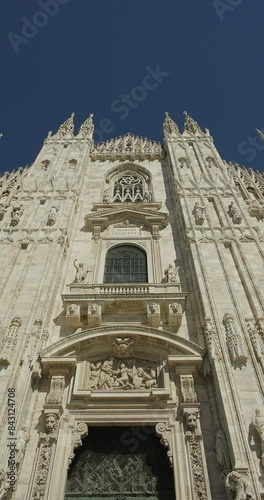 Milan Cathedral or Metropolitan Cathedral-Basilica of the Nativity of Saint Mary decoration exterior in Milan, Italy. Vertical shot photo