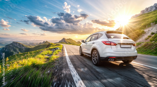 Car driving on a highway in the summer  mountains and sun in the background