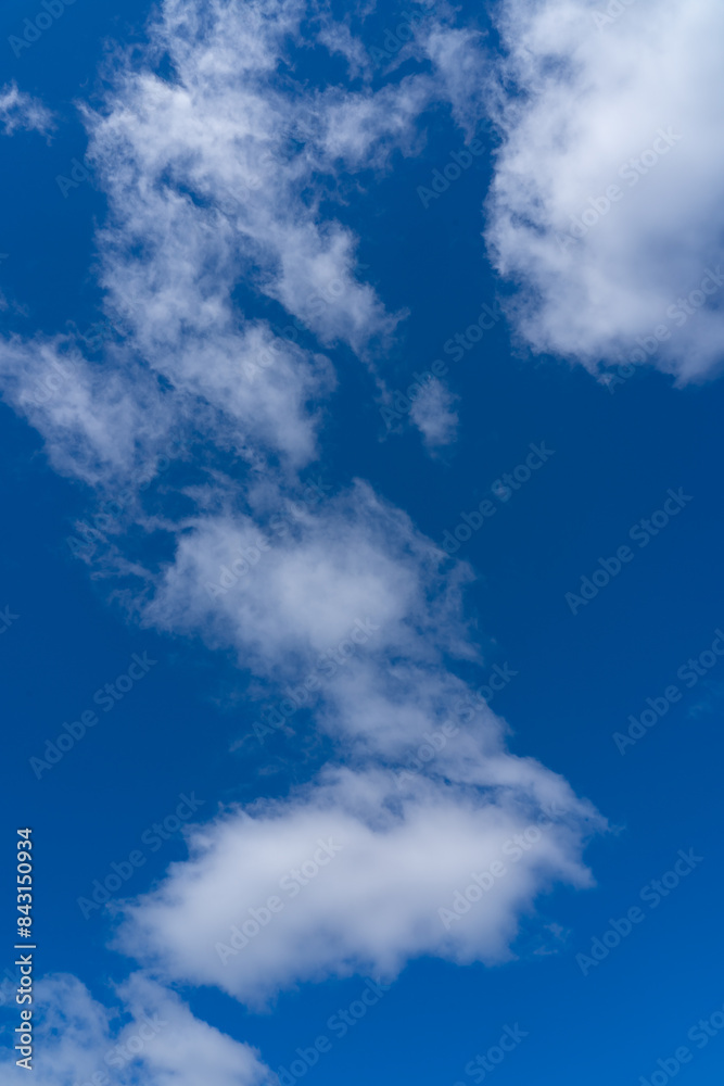 Obraz premium white fluffy clouds isolated on a black background