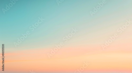 A blurred gradient of a sunrise with soft pinks and oranges.