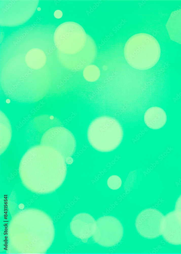 Green bokeh vertical background for banner, poster, ad, celebrations, and various design works Green bokeh vertical background for banner, poster, ad, celebrations, and various design works