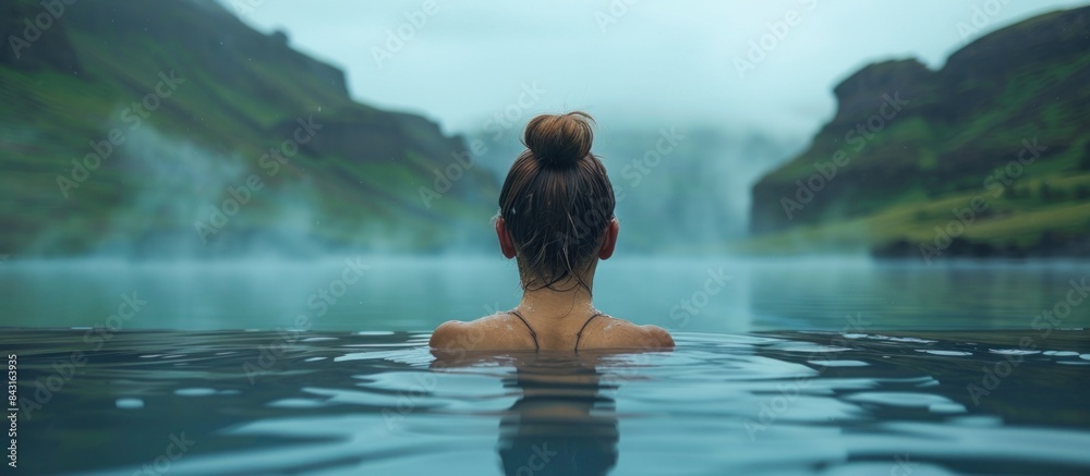 Young woman enjoying spa in hot springs in Iceland Young woman enjoying spa in hot springs in Iceland