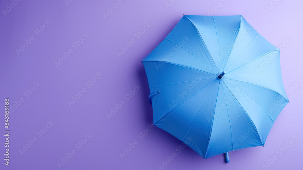 minimalist blue umbrella on a soft purple background, with copy space for text minimalist blue umbrella on a soft purple background, with copy space for text