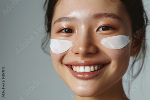 Asian skincare, beauty, and portrait of woman with collagen eye patch for health, wellness, and dermatological studio mockup. Face cosmetics therapy for pleasant skin on girl model. photo
