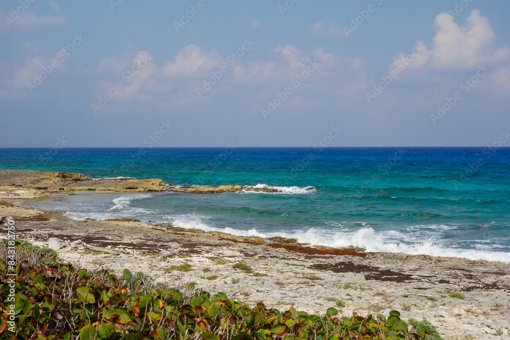 Turquoise blue waters of the Caribbean Sea on the island of Cozumel, Mexico Turquoise blue waters of the Caribbean Sea on the island of Cozumel, Mexico