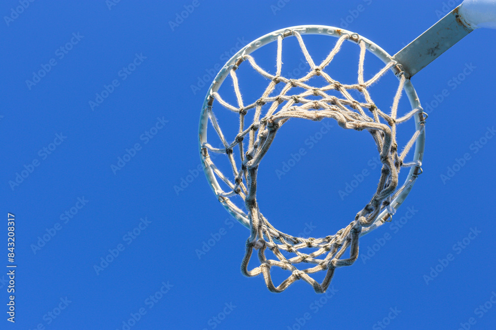 netball hoop against blue sky netball hoop against blue sky