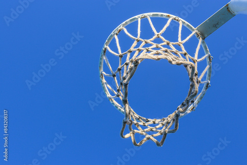 netball hoop against blue sky