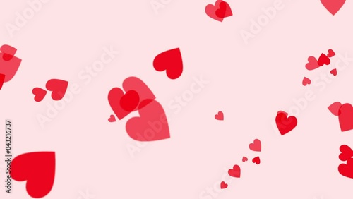 回転する赤いハートの背景. Background of a Rotating Red Heart.