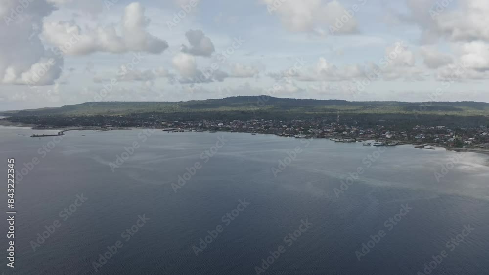Aerial video over a small village on a small island in Indonesia Wakatobi, wanci