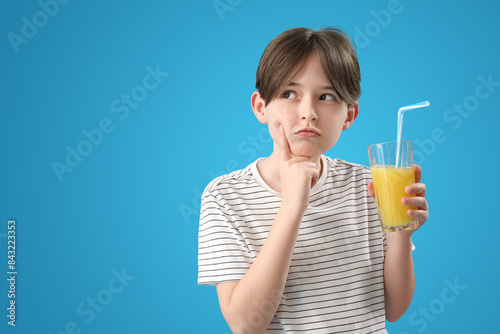 Thoughtful little boy with ...