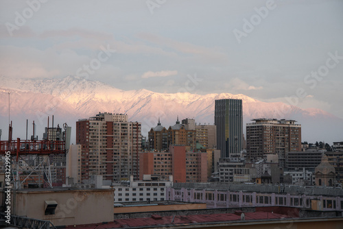 Obraz na płótnie Sunset with a view from above to the city of Santiago, Chile, with a view of the Andes mountains. w salonie