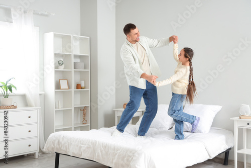 Father and his daughter dan...