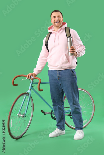 Male tourist with backpack ...