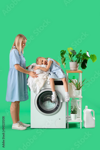 Happy mother and her little...