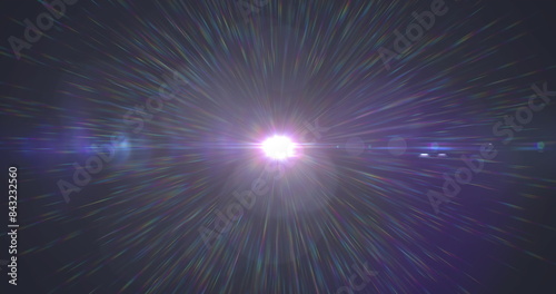 Image of light spots and trails over black background, copy space