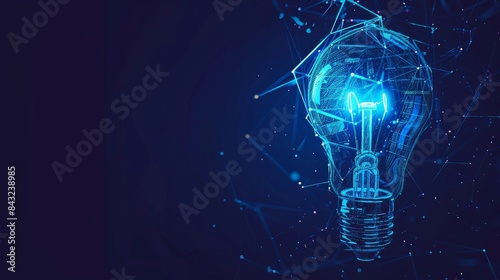 Glowing blue lightbulb on a dark background for technology and inspiration themed designs