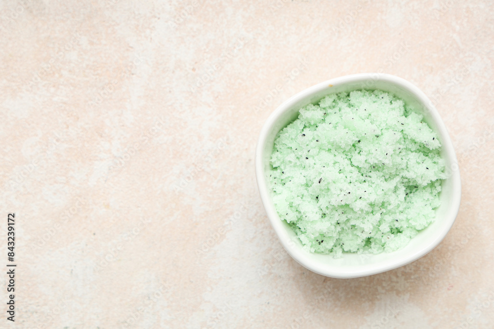 Bowl of natural body scrub on light background Bowl of natural body scrub on light background
