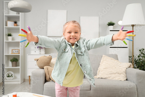 Cute little girl with her f...