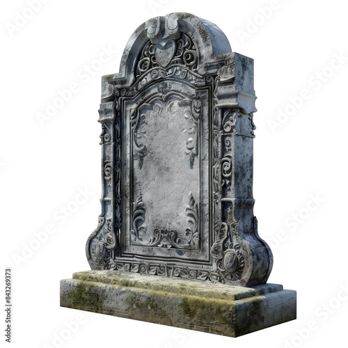 A stone headstone with a blank face sits on a stone base