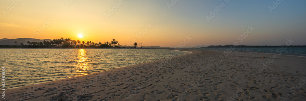 sunset at laem haad beach on ko yao yai in thailand