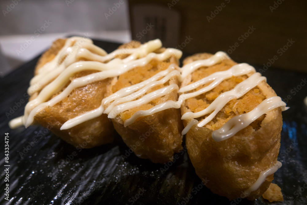 View of the fried tofu stuffed with rice View of the fried tofu stuffed with rice