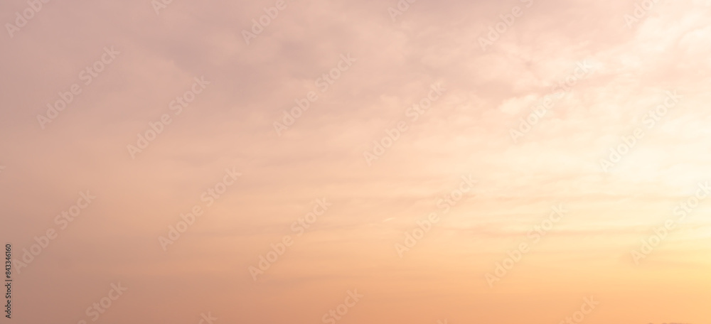 Fototapeta premium Beautiful morning or evening orange sky when sun set or sun rise used as natural background texture in decorative art work