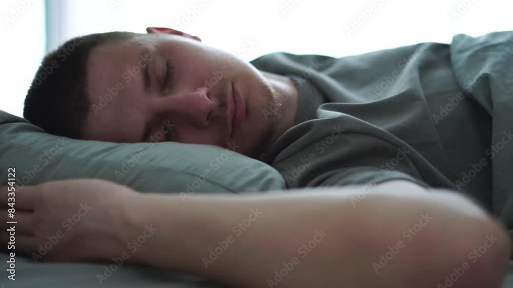 The man is lying on the bed.
Weekend morning.
The guy woke up and lies on the bed The man is lying on the bed.
Weekend morning.
The guy woke up and lies on the bed