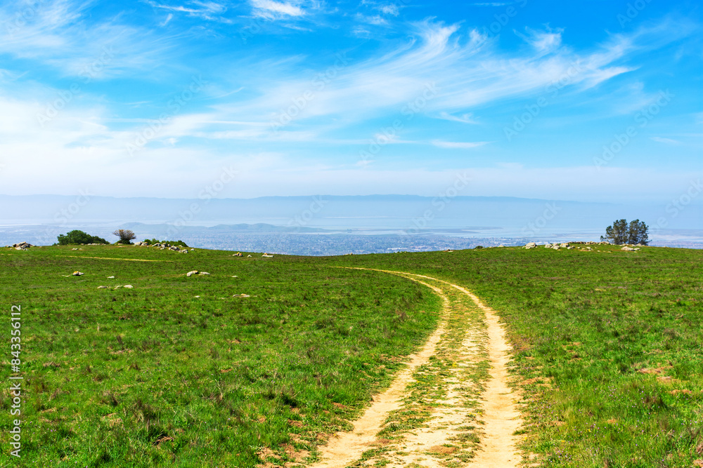 Scenic hillside dirt trail with sweeping vistas of San Francisco Bay Area Scenic hillside dirt trail with sweeping vistas of San Francisco Bay Area